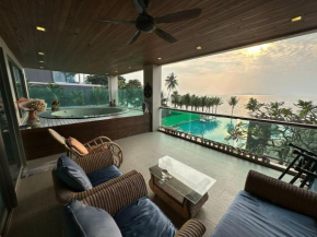 Luxury Beachfront Condo with Ocean Views